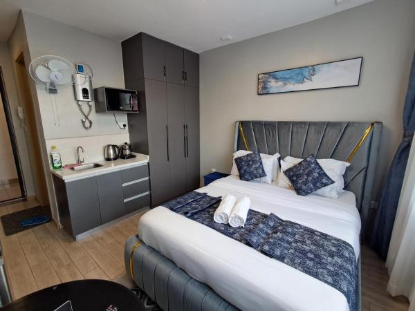 Favorite Staycation by Janice - Modern Comfort Near Airport, 예약  나이로비 케냐
