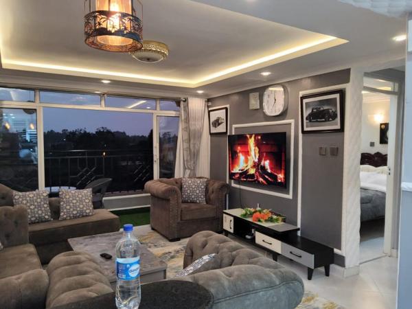 Unique Homes 1 Bedroom, 예약  Central 주차장이 있는 호텔, 주차장
